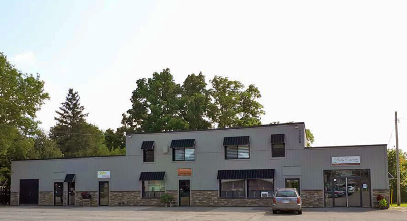 Versatta Stone/Royal Celect Board and Batten Siding