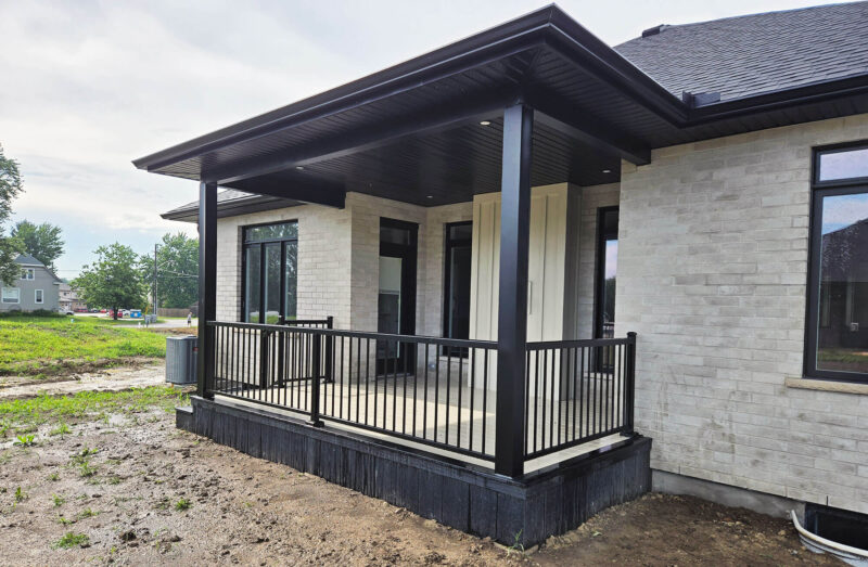 Modern Front Porch with Sleek Black Aluminum Railing